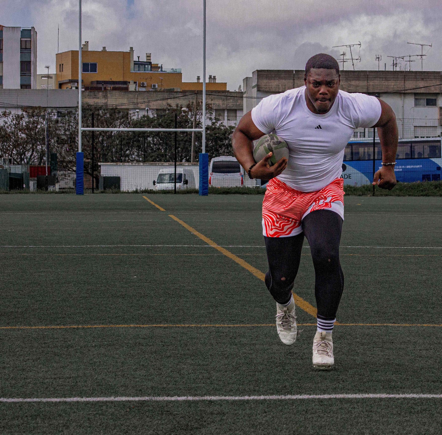 running man playing rugby 